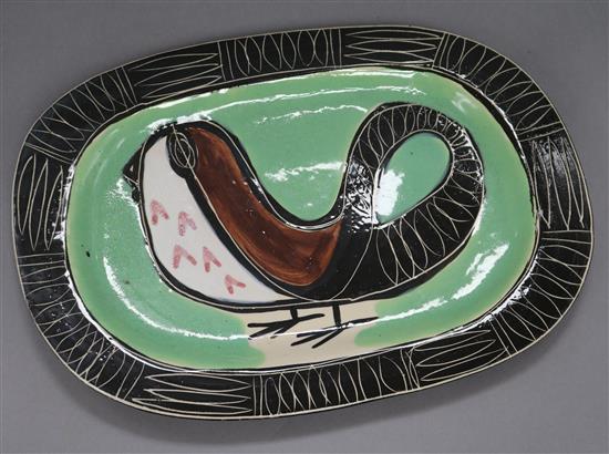 Jacques Pouchain. An oval studio pottery plate, signed length 31.5cm